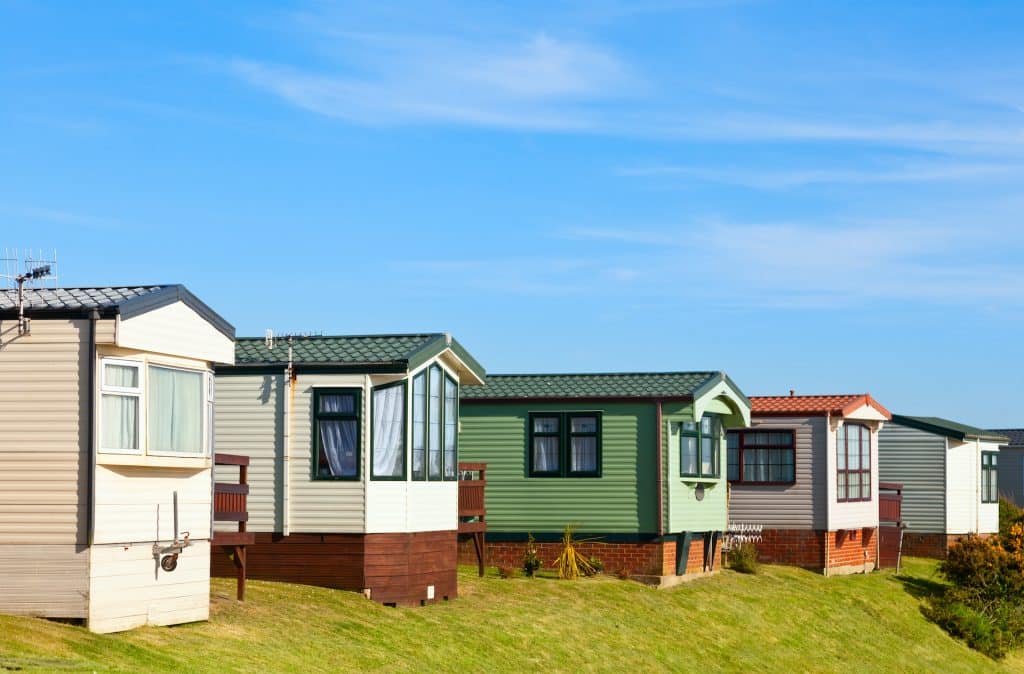 A mobile home park filled with several different mobile homes